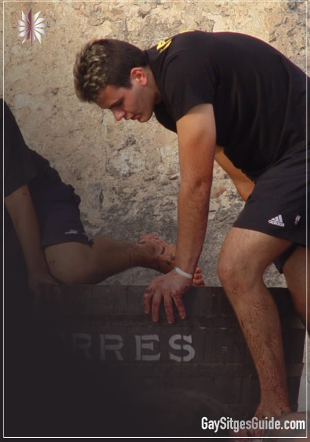 A Sitges Boy competing in the annual wine trashing event
